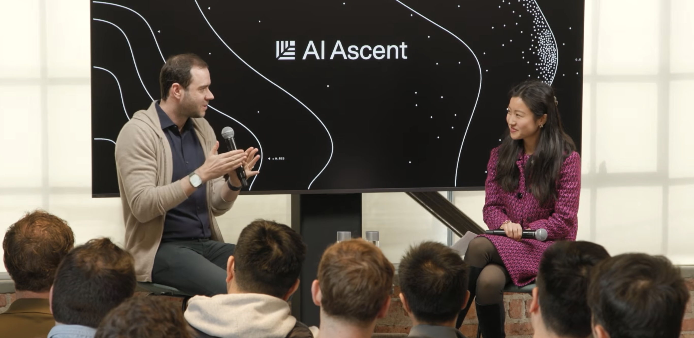Andrej Karpathy speaking at a technology event